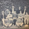 Edward Theophilus Nelson, standing, first on the left, with a group of students