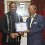 Dr. John Sumner and Vice Chancellor Ivelaw Griffith, Ph.D.