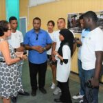 First Lady, Mrs. Sandra Granger chatting with the group of young innovators